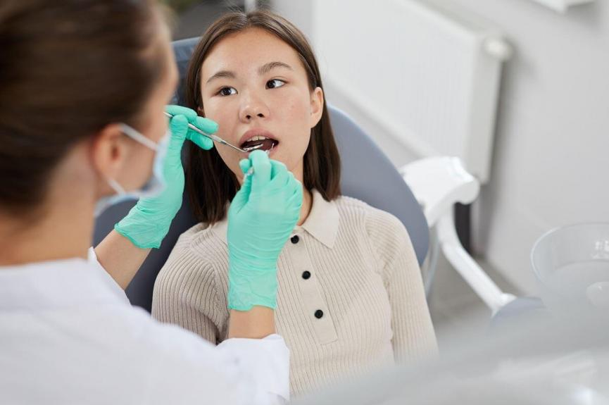 Asian Girl in Dental Chair Asian Girl in Dental Chair