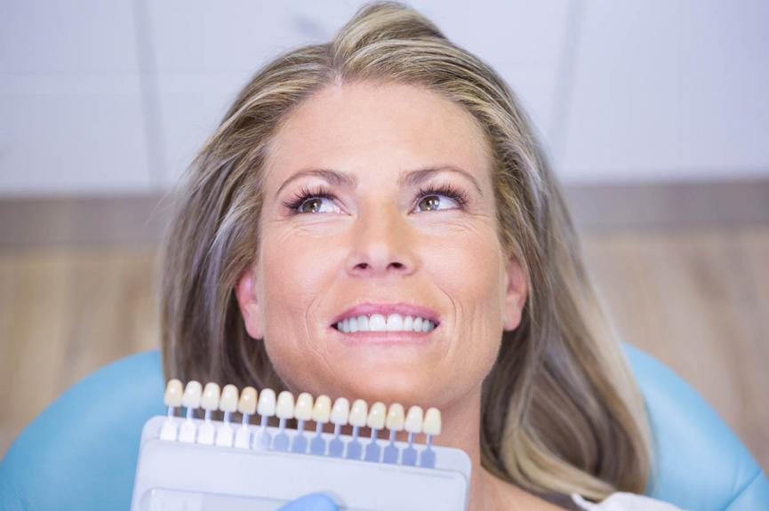 dentist holding teeth whitening equipment dentist holding teeth whitening equipment