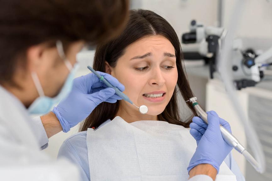 scared and anxious woman at the dentist scared and anxious woman at the dentist