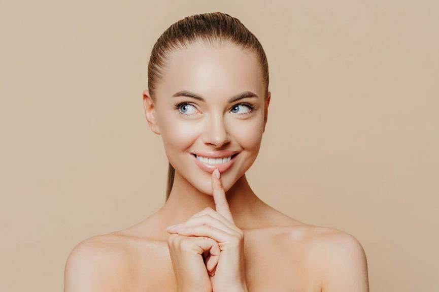 Dental crown us Woman with perfect white teeth