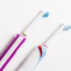 two electric toothbrushes