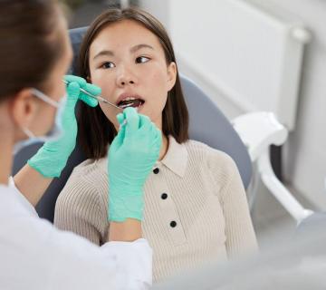 Asian Girl in Dental Chair
