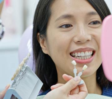 woman at dental clinic for teeth whitening