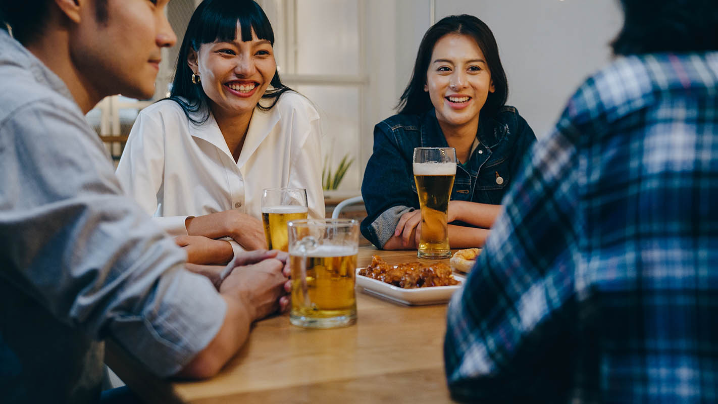 asian friends drinking alcohol